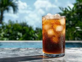 Refreshing iced drink by the pool. photo