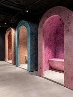 Abstract archways with colorful textured walls and built in seating photo