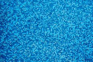 abstract background of ripple blue surface water in swimming pool photo