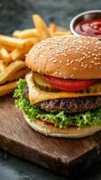 Cheese burger. American cheese burger with fresh salad and french fries photo