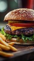 Cheese burger . American cheese burger with fresh salad and french fries photo