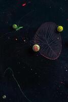 Paint in water. Amazing macro photography in the form of space and planets. photo
