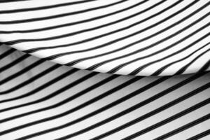 Striped fabric patterns create a dynamic visual contrast and texture play photo