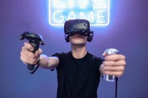 Man playing games and drinking energy photo