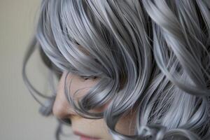 Woman showing her beautiful long gray hair photo