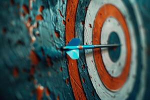 Blue arrow hitting the very center of an old, worn target photo