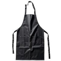 Black apron with pockets isolated on white background photo