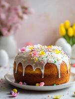 Side view of a beautifully decorated Easter cake with floral and candy accents photo