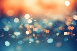 Abstract defocused bokeh lights creating festive background with orange and blue colors photo