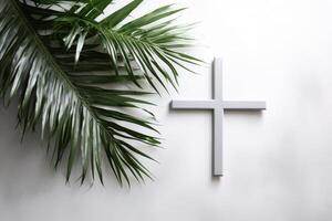 Palm sunday background with christian cross and palm leaf celebrating jesus entering jerusalem photo