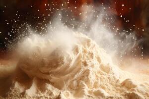 Flour exploding creating a cloud of dust and smoke photo
