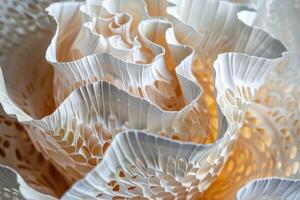Close up of a parametric wavy folded paper structure creating intriguing shadows photo