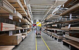 Building materials, things for the house and buyers in the big shop On a wonderful day photo