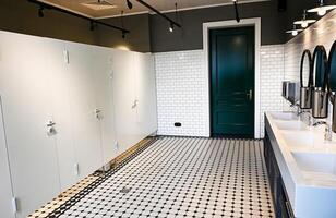 On a wonderful day with a positive attitude Modern interior of a public toilet photo