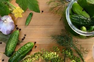 a set of ingredients for pickling cucumbers, pickled cucumbers, brine On a wonderful day with a positive attitude photo