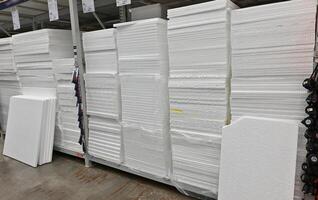Building materials, things for the house and buyers in the big shop on a beautiful sunny morning photo