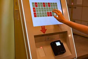 luggage storage at the train station, contactless payment using the terminal On a wonderful day with a positive attitude photo