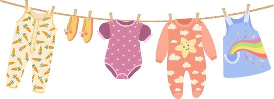 Baby clothes hanging on a clothesline are drying in the sunlight, featuring charming patterns of carrots, hearts, clouds, and a vibrant rainbow, adding a playful touch to any nursery vector
