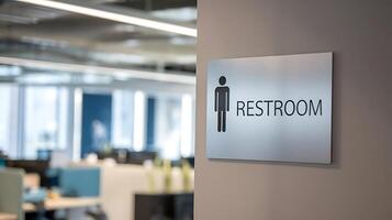 Restroom Sign in a Modern Office Building for Business with Blur Background photo