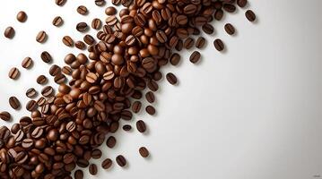 Roasted coffee beans arranged on a white surface, creating a visually appealing background for business use photo