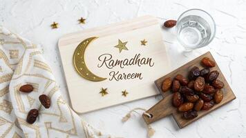 Ramadhan Kareem celebration image with dates and water for business use during ramadan photo