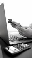 black and white . man enters bank card details into phone and makes online purchases via internet. outdated payment systems require modernization and simple secure payment methods video