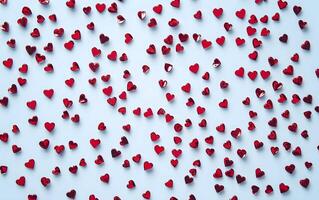 Multitude red heart shapes texture. Celebrate affection. Happy Valentines Day greeting card, website and social media post. photo