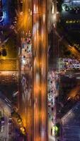 Aerial timelapse of evening traffic at intersection in Hanoi, Vietnam. video