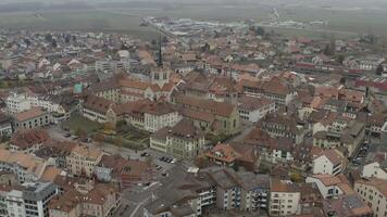 Aerial view of Payerne town center in the Alps in Switzerland. 4K video