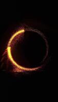 The fiery disk of the time portal, emitting sparks falling to the floor, rotates spectacularly against a black background. video