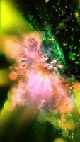 A 3D glowing pearlescent, hazy galaxy rotates, emitting light and scattering brilliant meteors. video