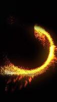 The golden disk of the time portal, emitting sparks, rotates quickly and effectively against a black background. video