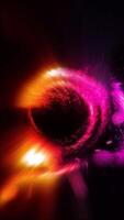 The purple-red disk of the space and time portal, emitting sparks, rotates quickly and efficiently against a black background. video