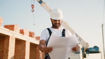 Indian Construction Worker Reviewing Plans On-Site video