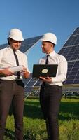 Two Engineers Analyze Solar Energy Project Onsite video