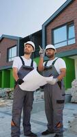 Indian architect and supervisor meeting at construction site video
