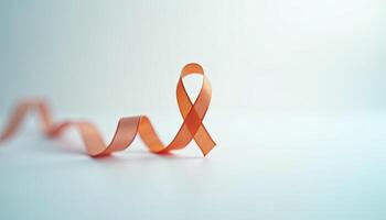 Orange Ribbon for Self Injury Awareness Day Symbol with text placement area photo
