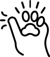 Close up of a cats paw resting on a human hand vector
