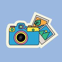 Cute camera in doodle style on a blue background sticker in 2k style graphics illustration vector