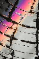 A Close-Up View of an Intricate Pattern Displaying Pink, Purple, Orange, and Yellow Hues - Perfect for Abstract Art and Design Projects photo