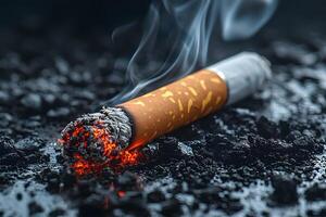 Burning Cigarette on Ashes - Smoking Addiction and Health Concept photo