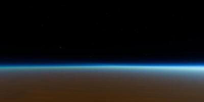 Breathtaking view of earth from space with stunning starry sky horizon photo
