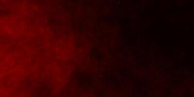 Deep red cosmic nebula with subtle star details in space photo