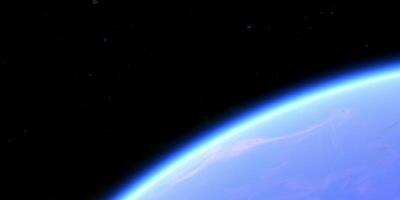 Earth horizon view from space with starry background and curved atmosphere photo