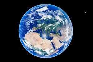 Stunning high-resolution image of earth from space highlighting europe and africa with moon in distance photo
