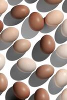 Pattern of Brown and White Eggs with shadows, minimal style aesthetic holiday background, isolated natural organic chicken eggs, mocha mousse trend color, minimalist food composition, neutral colored photo