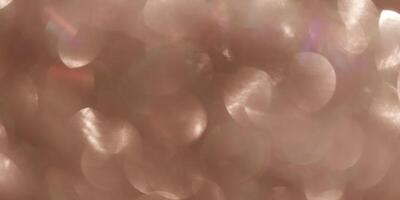 Abstract bokeh background banner mocha mousse colored, natural optical flare from sunlight, trend color year 2025, gradient color, blurr bokeh texture as aesthetic textured pattern, bege brown color photo