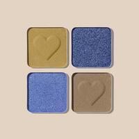 Colorful Eyeshadow Palette with Matte and Shimmer blue green yellow colored shades on beige. Set of eyeshadow refills, Top view of four Swatches Eyeshadow makeup for cosmetic, makeup, beauty concept photo