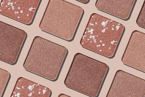 Cosmetics texture pattern, makeup palette vivid neutral color eye shadow, square eye powder swatches. Female cosmetic and beauty products, aesthetic minimal beauty photo, shimmer eyeshade, top view photo