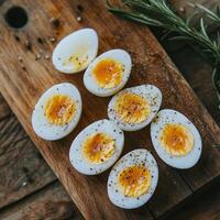 Hard boiled eggs on a cutting board photo
